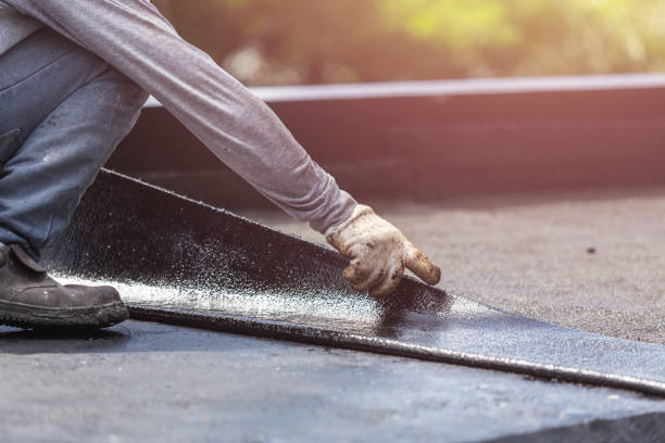 Professional Basement Waterproofing technician working in Englewood, OH